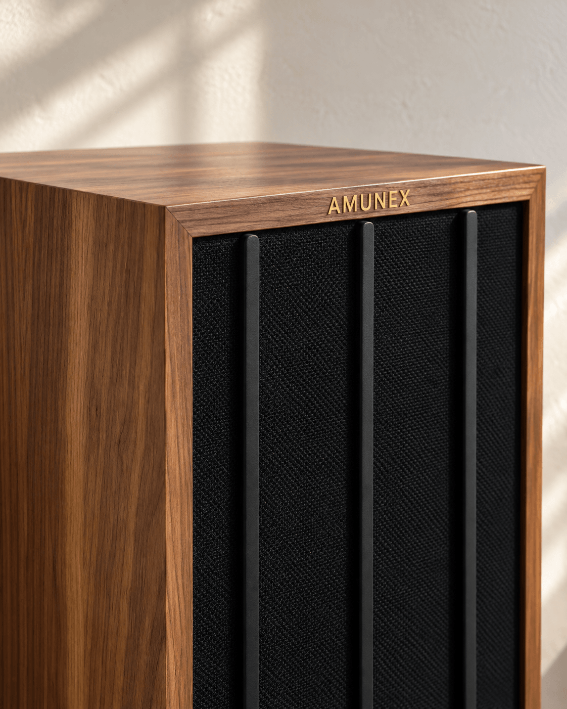 Detail of AX1 wood-grain cabinet, AMUNEX wordmark and matte black front bars